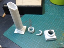 The plastic column was butchered with a rotary tool...